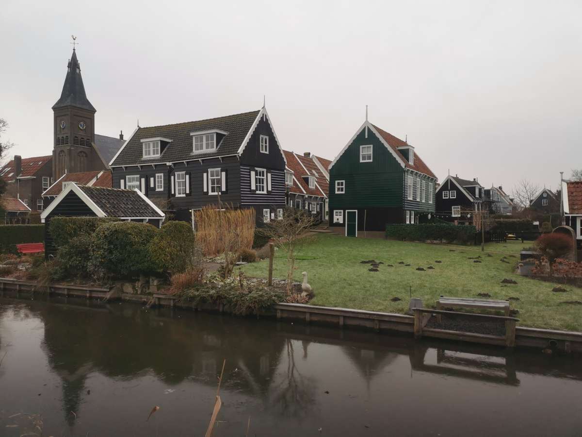 Traditional Dutch village of Marken with church tower